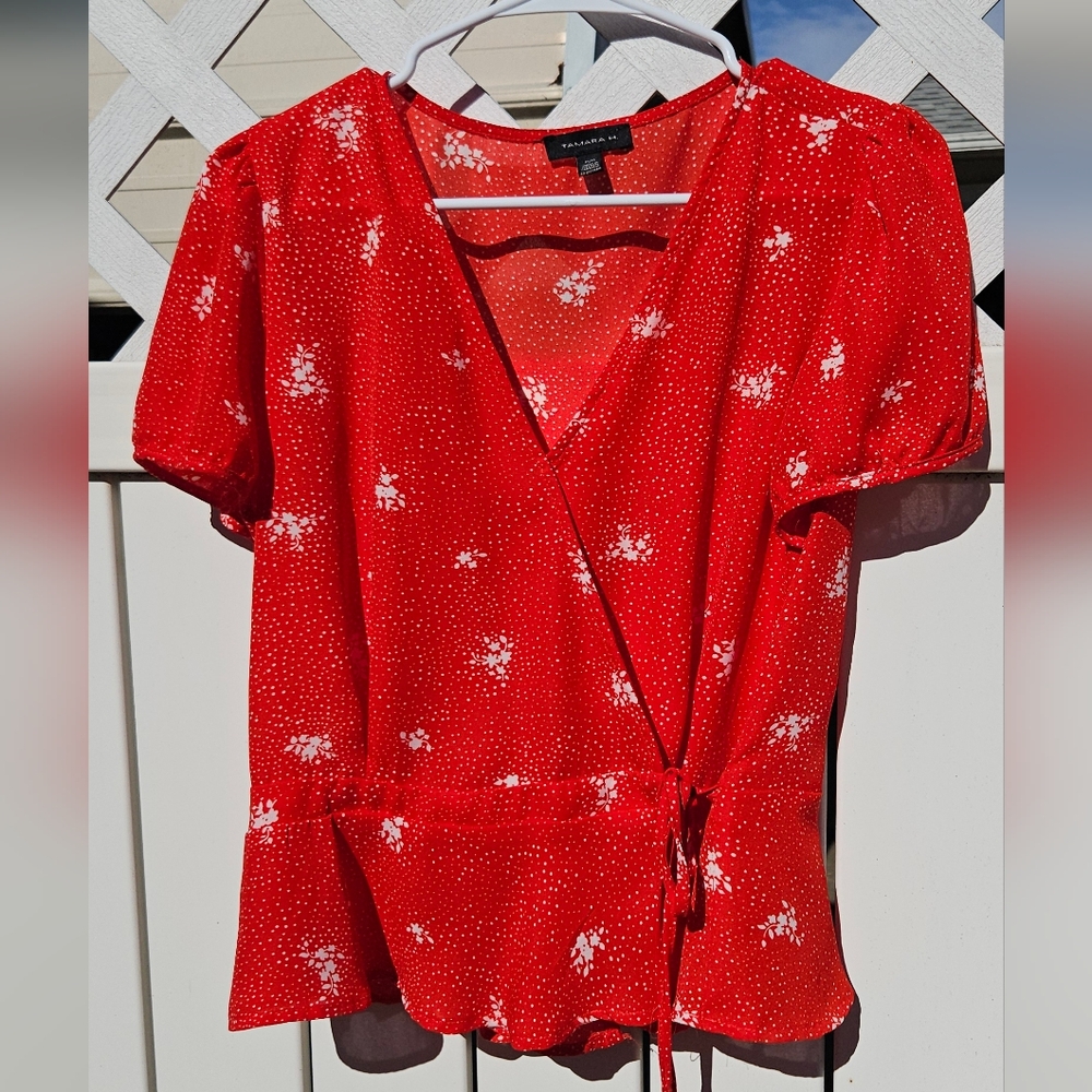 Tamara H. Vibrant wrap top
